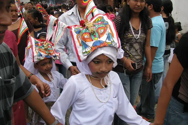 Children in Gai Jatra costume walking in the procession